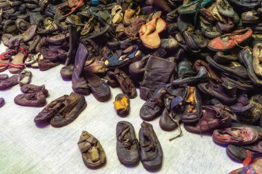 Oswiecim, Poland- 15 August 2022: Pile of shoes belonging to prisoners at Auschwitz WWII Nazi concentration camp, Poland