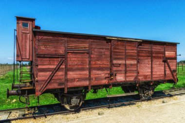 Oswiecim, Poland- 15 August 2022:A railroad car next to the ramp, it stands at the place where SS physicians carried out selection, sending the majority of the deported Jews to death in the gas chamber