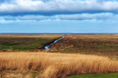 Holwerterpolder, UNESCO Wadden Deniz Mirası sahasının eşsiz bir parçasıdır..