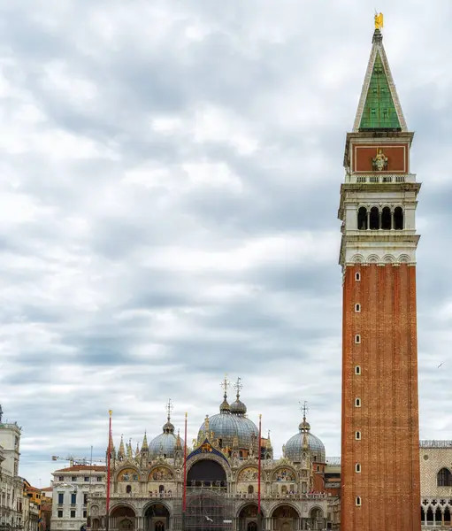 Piazza San Marco with the Basilica of Saint Mark and the bell tower of St Mark\'s Campanile (Campanile di San Marco) in Venice, Italy