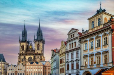 The beautiful facades of medieval houses and towers of Our Lady before Tyn Church in background, Old Town Square, Stare Mesto, Prague, Czech Republic clipart