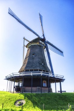 The Herder flour mill is located on the Westerdijk, Medemblik , The Netherlands clipart