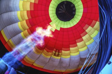 The flame from the burner of a hot air balloon clipart