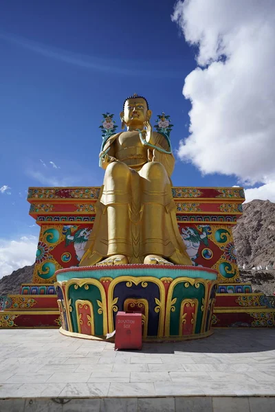 Big statue of the buddha near temple