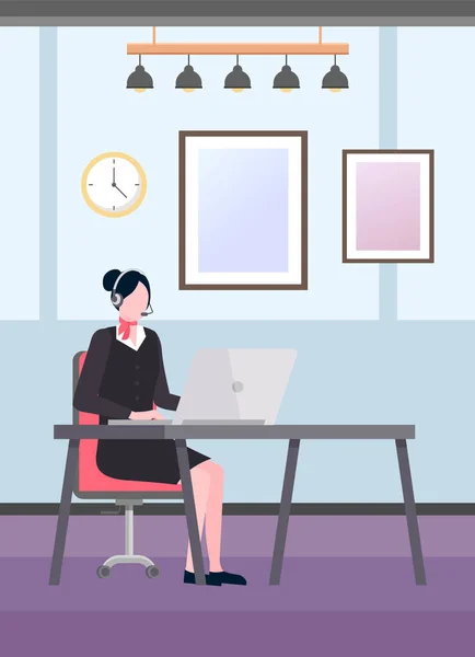 stock vector Businesswoman with headset at computer talking online with video call application. Online meeting and conference, online webinar and training, job interview concept. Woman working at office space