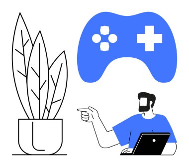 Adam dizüstü bilgisayar kullanırken mavi oyun kumandası ve soyut saksı bitkisiyle işaret ediyor. Teknoloji, oyun, ofis işi, uzaktan kumanda, ev dekorasyonu, yaratıcılık modern yaşam tarzı için idealdir. Soyut