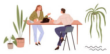 Ahşap bir masada, ev bitkileriyle çevrili, dizüstü bilgisayar ve kahveyle iş birliği yapan meslektaşlar. Takım çalışması, iletişim, ofis kültürü, işbirliği, çalışma alanı estetiği, yaratıcılık için ideal