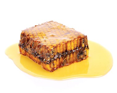 Beyaz arka planda bal tarağı. Bal sağlık bitkisidir..