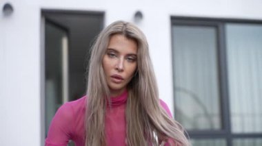 This stock video shows a beautiful girl in sexy erotic lingerie, slow motion