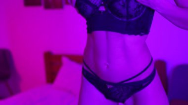 This stock video shows a beautiful woman in sexy lingerie