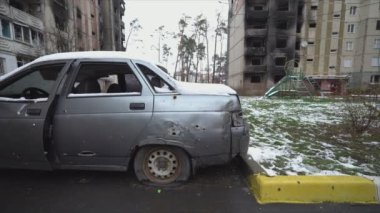 This stock video shows a shot down civilian car during the war in Ukraine in 8K resolution