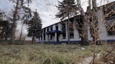 This stock video shows a police station destroyed during the war in Ukraine, slow motion