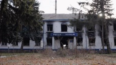 This stock video shows a police station destroyed during the war in Ukraine, slow motion