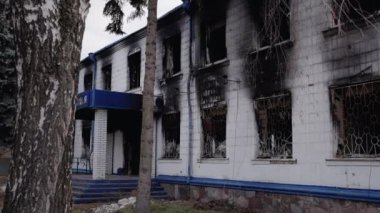 This stock video shows a police station destroyed during the war in Ukraine, slow motion