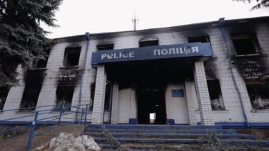 This stock video shows a police station destroyed during the war in Ukraine, slow motion