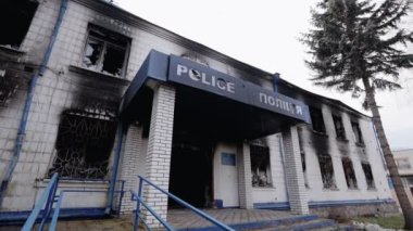 This stock video shows a police station destroyed during the war in Ukraine, slow motion