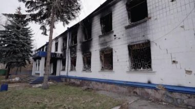 This stock video shows a police station destroyed during the war in Ukraine, slow motion