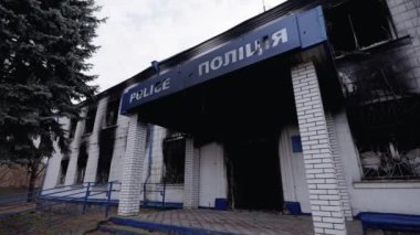 This stock video shows a police station destroyed during the war in Ukraine, slow motion