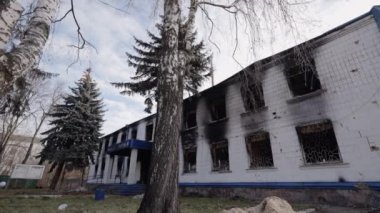 This stock video shows a police station destroyed during the war in Ukraine, slow motion