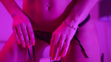 This stock video shows a beautiful woman in sexy lingerie