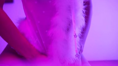 This stock video shows a beautiful woman in sexy lingerie