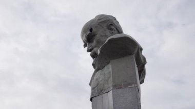 This stock video shows the shot-through monument to Taras Shevchenko in Borodyanka, Ukraine