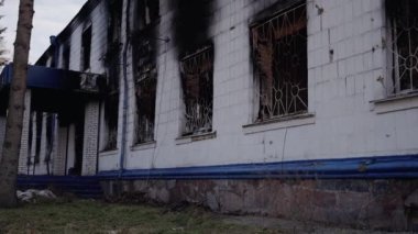 This stock video shows a police station destroyed during the war in Ukraine
