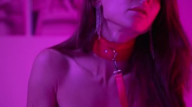 This stock video shows a woman in erotic sexy lingerie