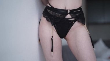 This stock video shows a beautiful woman in sexy lingerie