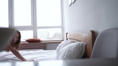 This stock video shows a woman in erotic sexy lingerie