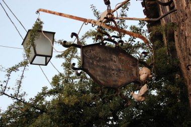 old rusty metal lamp in the city