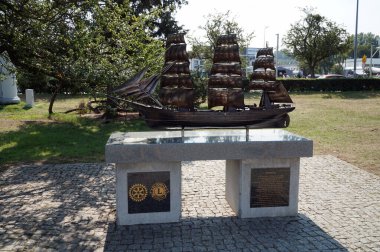  Bronze sculpture of an old sailing ship on the embankment of the Baltic Bay. Gdynia. Poland.     