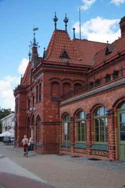 Red brick train station in the city of Gdynia. Poland.