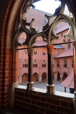 Indoor galleries of the main courtyard in the castle of the Knights Templar in Malbork. Poland.