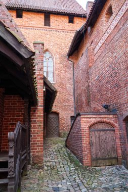Main courtyard of the Teutonic Castle in Malbork. Poland.