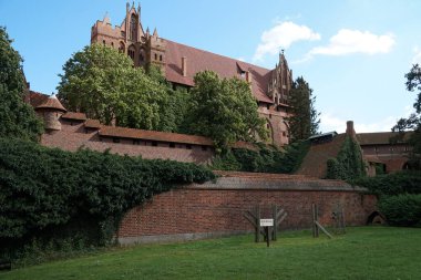 Red brick fortress walls in the castle of the Teutonic Order in Malbork. Poland.