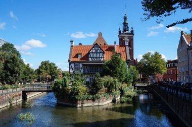 Beautiful buildings and a canal in the historic center of Gdansk. Poland.