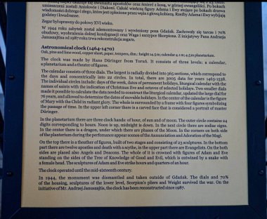  A plaque with a description of the astronomical clock of the 15th century in St. Mary's Cathedral in Gdask. Poland.