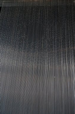 Metal tellerden oluşan gri arkaplan