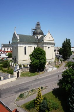 View of the church from the height of the walls of the fortress in Zhovkva.    clipart