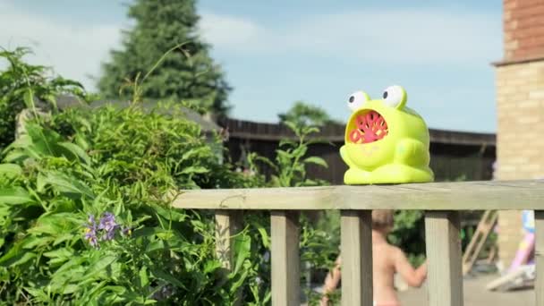 Hot Sunny Day Garden Blowing Catch Spray Bubbles Hands Happy — Video