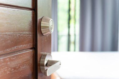 Open of wooden teak door in modern house interior style room home design concept