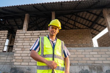 Engineer man working on construction site new house building inspector man