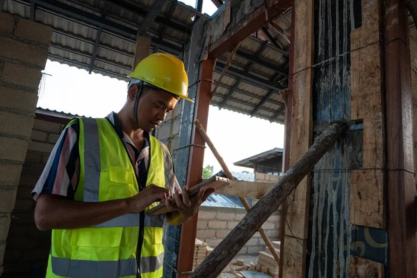 Engineer man working on construction site new house building inspector man