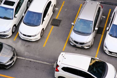 Aerial view colorful car parking lot in condominium resident transport background