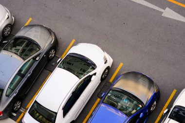 Car parking lot in modern condominium living look down view transport business