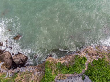Aerial view seashore wave on rocky cliff nature landscape