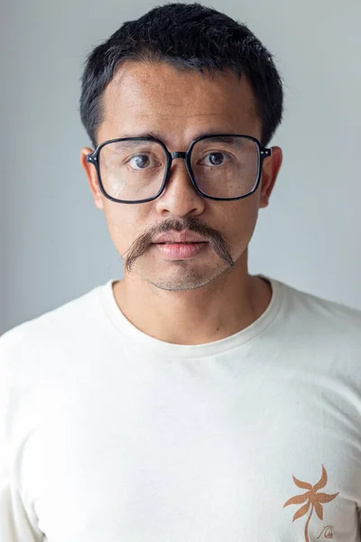 Artist mustache man facial face wear glasses angry motion on white background