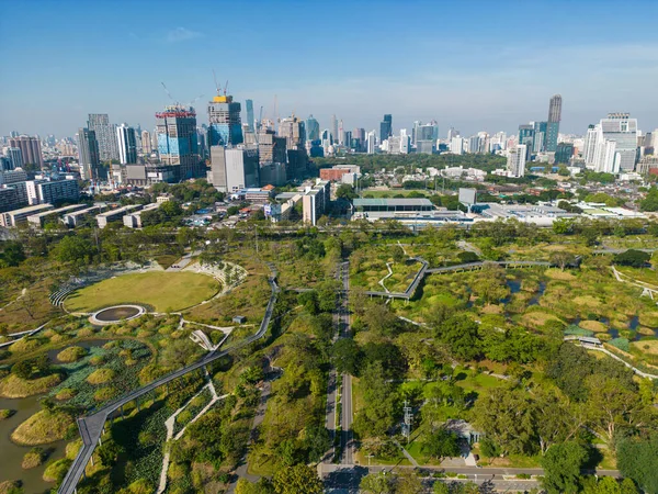 stock image Benjakitti Forest public Park new landmark of central Bangkok with office building aerial view in Bangkok, Thailand.