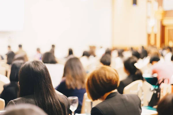 stock image Abstract blurred people sitting seminar in hotel room business education background